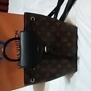 SOLD  Authentic LV Monogram Mountsouris BB Backpack